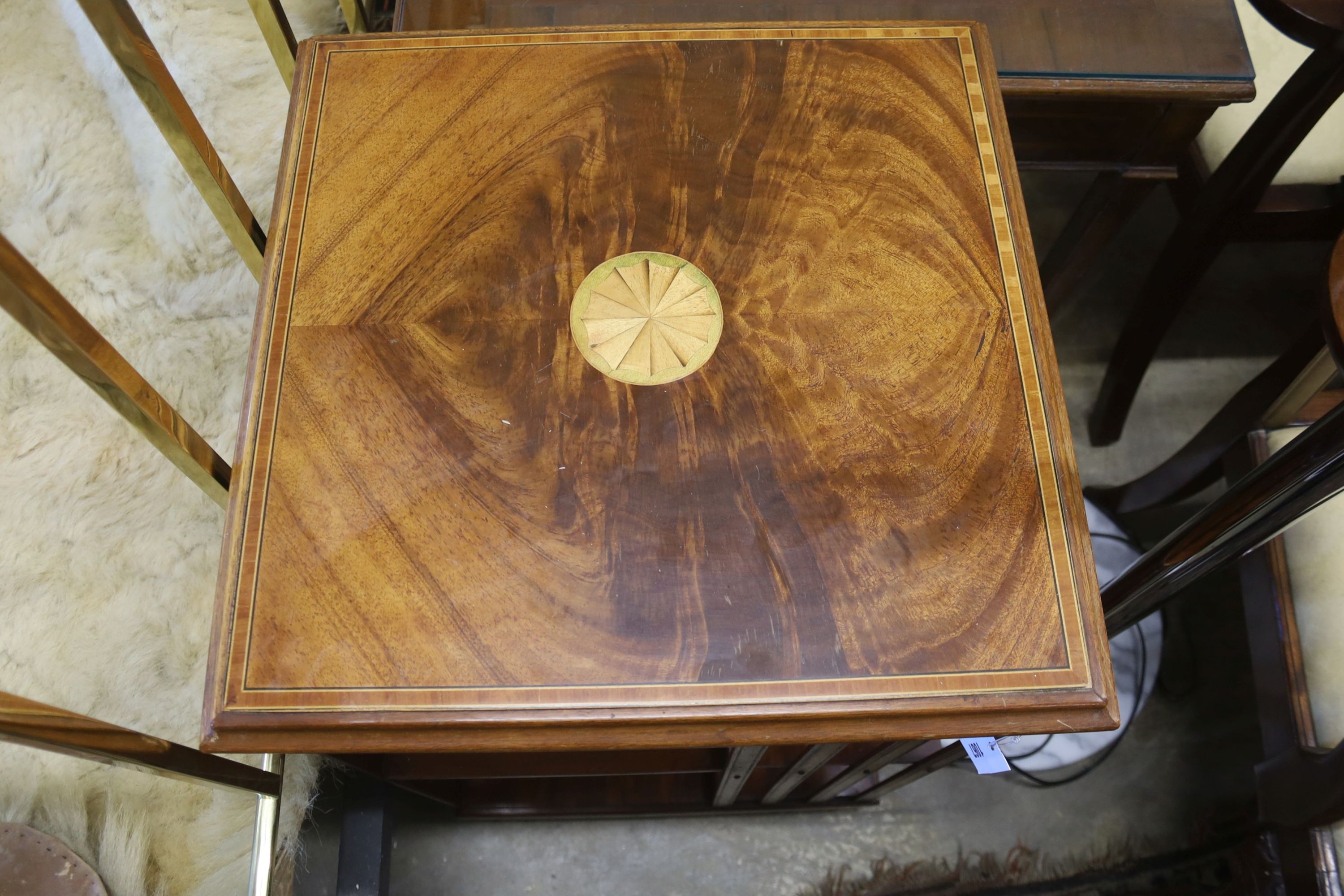 A reproduction Edwardian design inlaid mahogany revolving bookcase, width 49cm, height 80cm